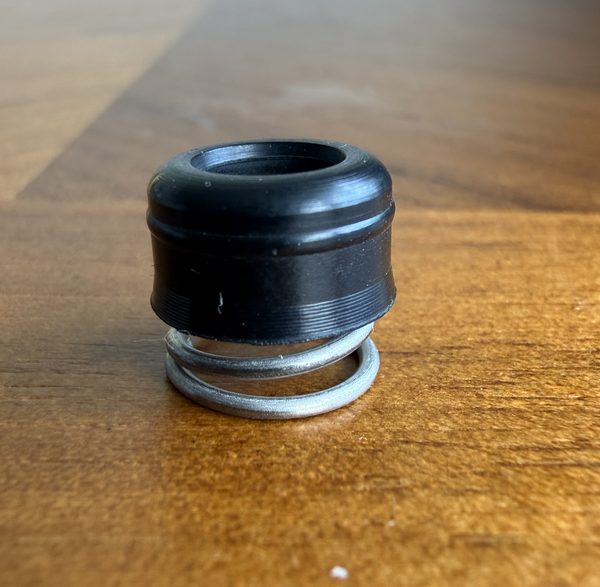 Replacement for Delta RP4993, spring under the seat Replacement for Delta RP4993: the coil spring set under the black rubber seat